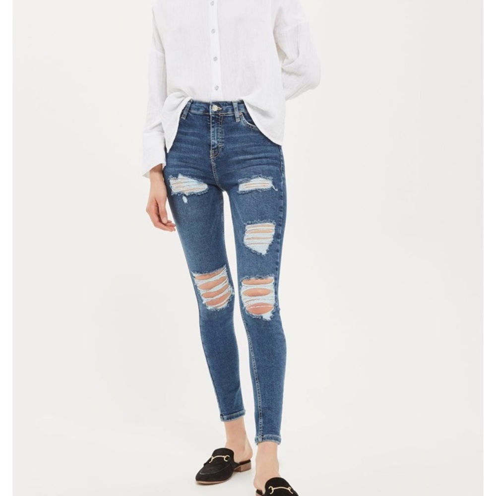 Skinny leg blue ripped jeans